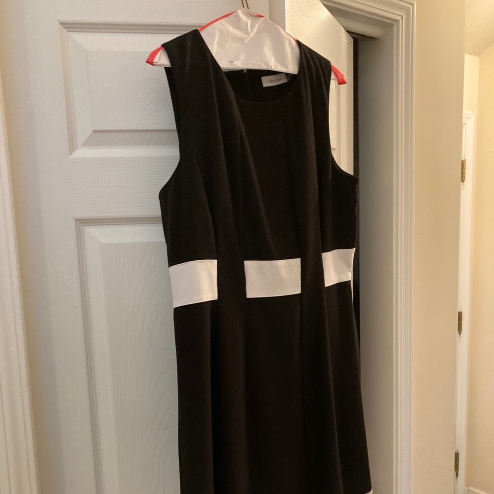 Calvin Klein size 12. Zip up back.